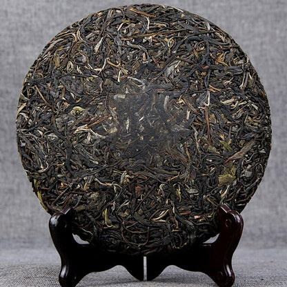 Top Tea Nannuo Mountain Ancient Tree Raw Puer Pure Material Shen Puerh Tea 357g