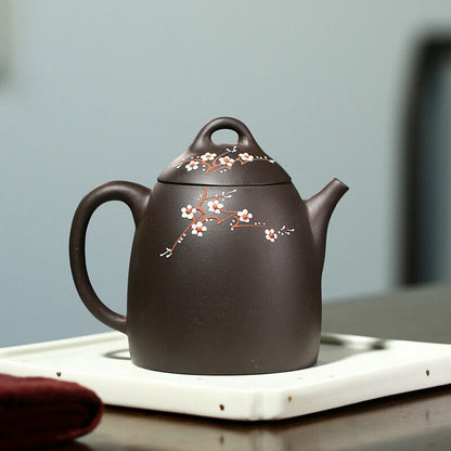Yixing teapot black mud handmade teapot Kung Fu tea set plum blossom Qin Quan