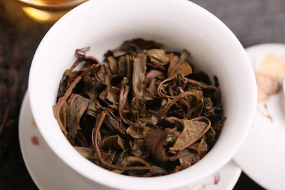 2003 Kong Ming Shan Pressed Qizi Cake of Yiwu Classic Tea Puerh Puer Raw 357g