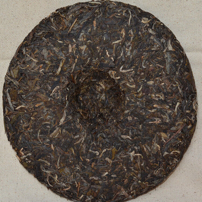 2012 Xiaguan Ma Hei Yuan Cha YiWu Ancient Tree Pu-erh Tea Cake Raw Pu'er 357g