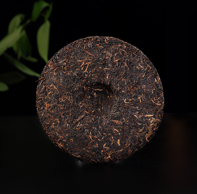 2006 Bajiaoting Valley Flower Tea Raw Pu'er KONG QUE ZHI XIANG QI ZI BING 357g