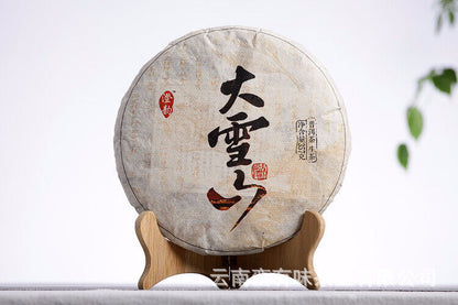 357g/12.59oz Pu'er Tea Da Xueshan Early Spring Ancient Raw Tea Seven Seed Cake