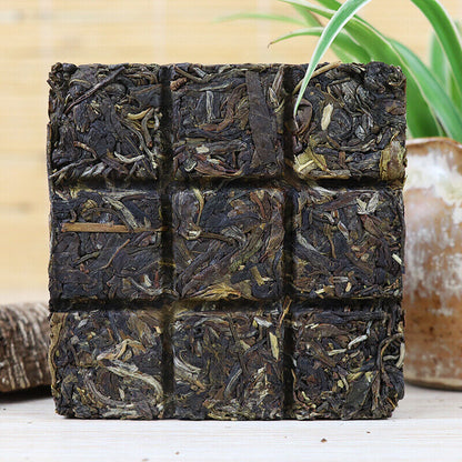 100g Big Snow Mt. Yunnan Xiaguan Puer Gold Silk Pu-erh Pu'er Brick Tea