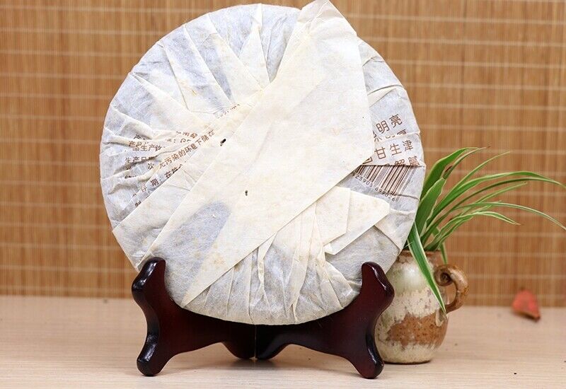 Li Ming 7590 Octagonal Pavilion Yunnan Aged Pu-erh Tea Cake 2010 357g Ripe Puer