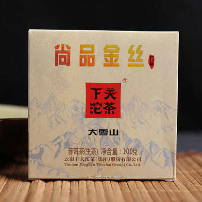 100g Big Snow Mt. Yunnan Xiaguan Puer Gold Silk Pu-erh Pu'er Brick Tea