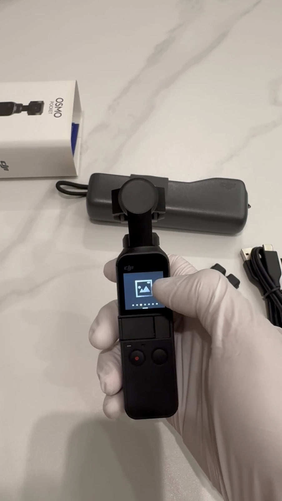 DJI Osmo Pocket-Handheld 3-Axis Gimbal Stabilizer with integrated Camera