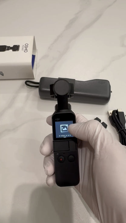 DJI Osmo Pocket-Handheld 3-Axis Gimbal Stabilizer with integrated Camera