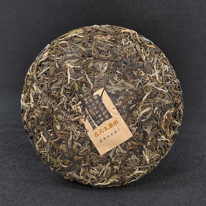 357G ancient tree tea Pu'er tea raw tea Yiwu tea cake Yunnan Qizi cake tea -