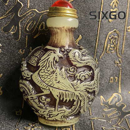 Ancient Chinese beautifully carved dragon and phoenix luminous snuff bottle