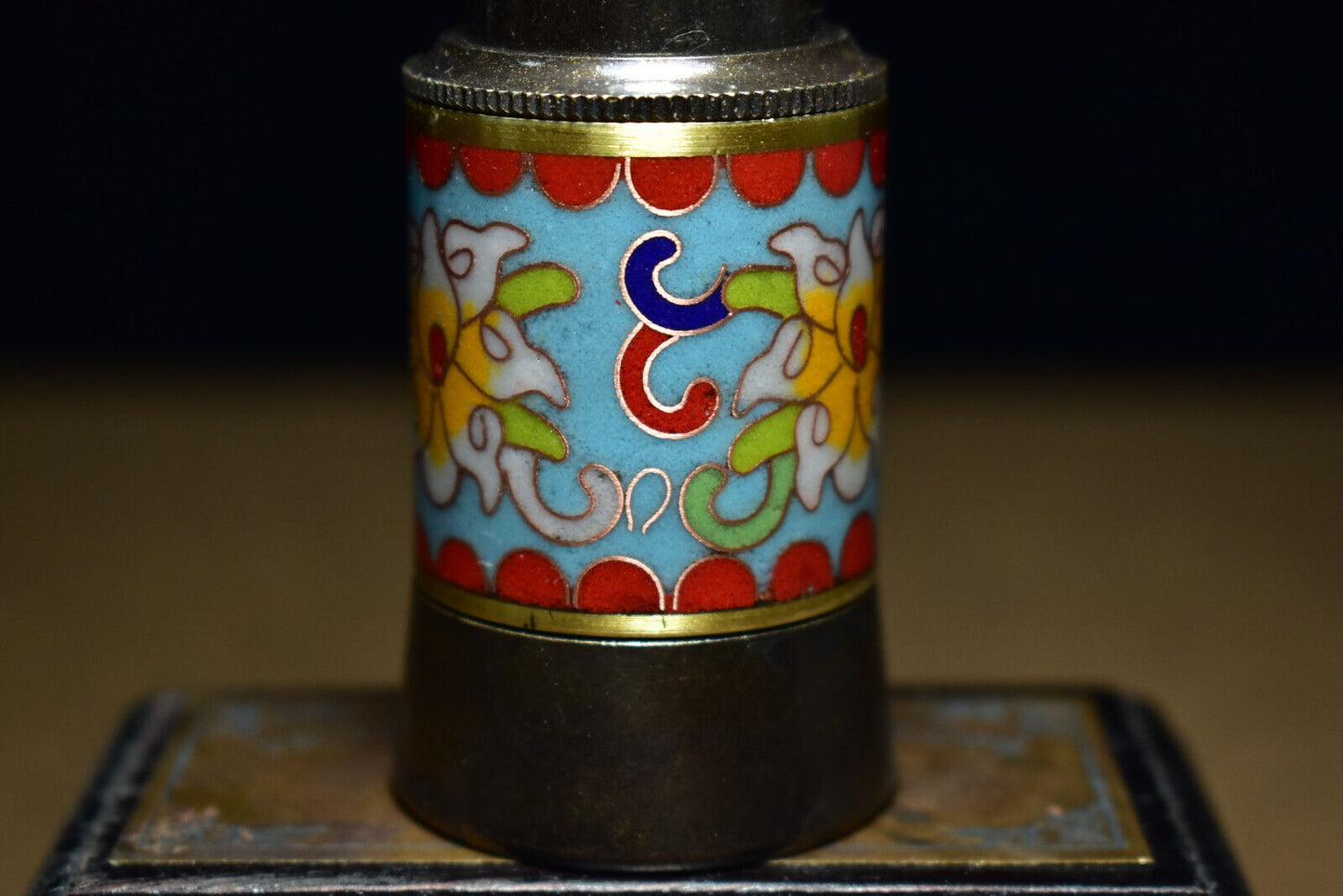 An ancient brass based cloisonne telescope