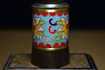 An ancient brass based cloisonne telescope