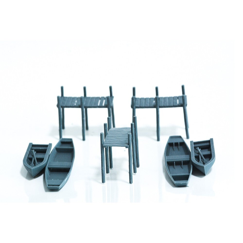 1/64 Part Of The Dock Boats And Canoes Scene Of The Railway Layout.