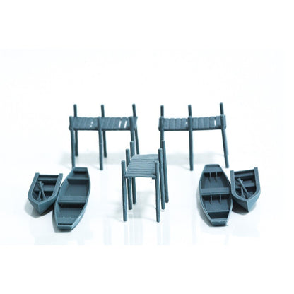 1/64 Part Of The Dock Boats And Canoes Scene Of The Railway Layout.