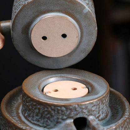 Pottery Automatic Lazy Stone Grinding Tea Set Rotating Teapot Kung Fu Tea Set