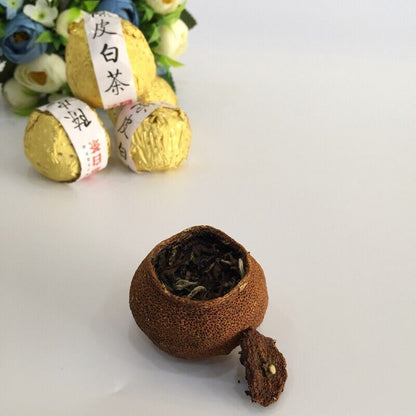 White tea filled orange Fuding Chenpi Bai Cha Old Shou Mei-