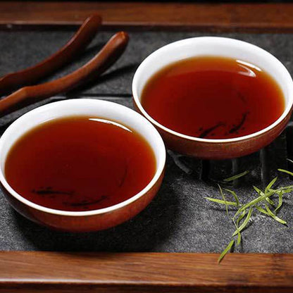 100g Yunnan 2012 Chen Nian Old Tree Pu'er Tea Ripe Tea Cake Qizi Cake Tea