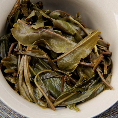 Top Tea Nannuo Mountain Ancient Tree Raw Puer Pure Material Shen Puerh Tea 357g