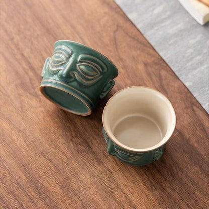 chinese porcelain blue glazed mask tea cup