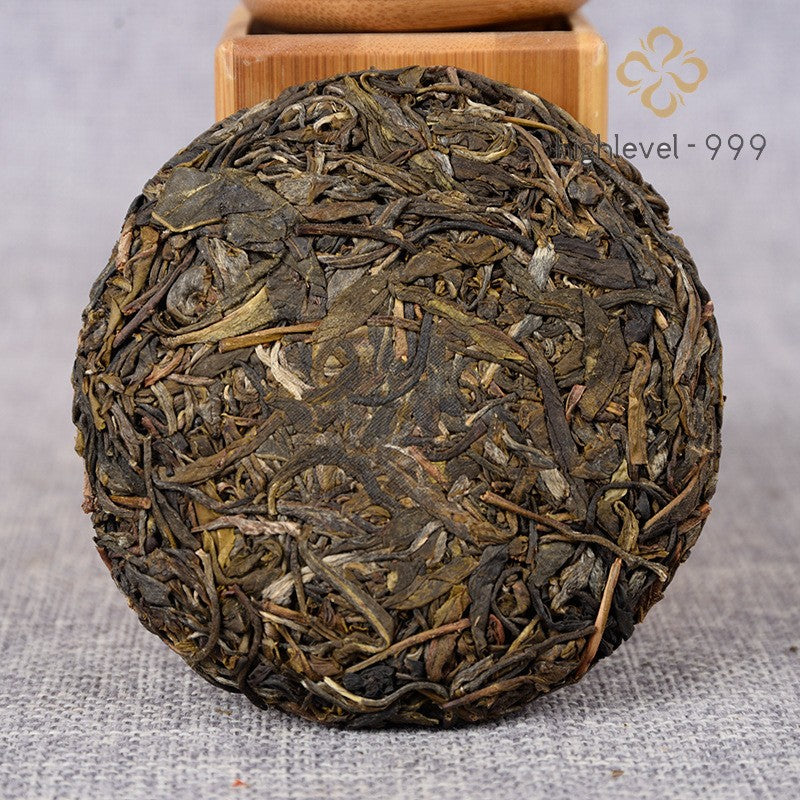 100G raw Pu'er tea cake Yunnan Xiniu Tanggu tree early spring leaf tea -