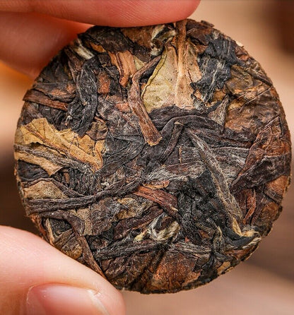 Bai mu dan cake,FuDing white tea Lao Bai Cha Old aged Small Pai Mu Tan tea