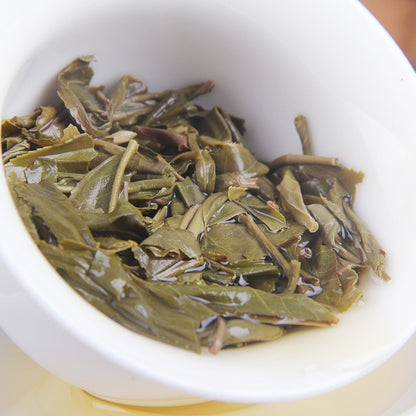 100g Raw Pu-erh Tea Kunlu Mountain Ancient Tree Menghai Mini Compressed Tea Cake