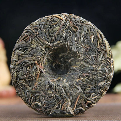 100g Raw Pu-erh Tea Kunlu Mountain Ancient Tree Menghai Mini Compressed Tea Cake