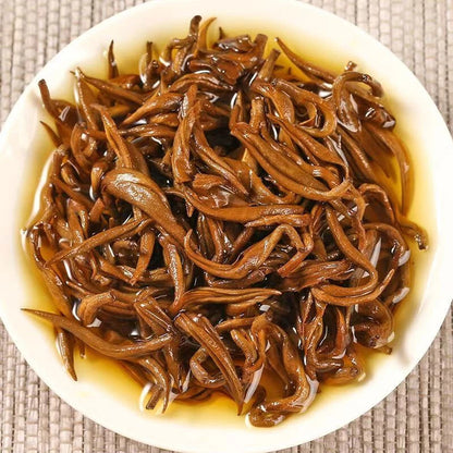 Premium Golden Snail Dian Hong Jin Luo Handmade Pure Bud China Yunnan Black Tea