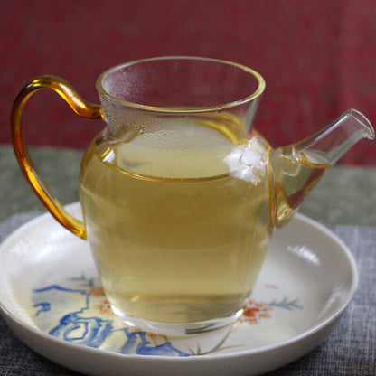100g Yunnan Pu'er tea Icelandic raw peacock green cake seven cakes Mengku tea