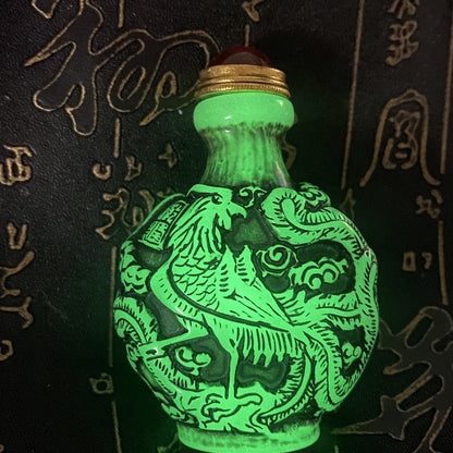 Ancient Chinese beautifully carved dragon and phoenix luminous snuff bottle