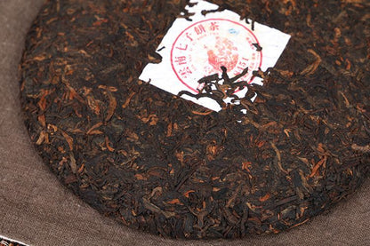Yun Nan Qi Zi Bing Cha Yunnan Menghai LangHe 8451 Pu'er Puerh Ripe Tea 357g