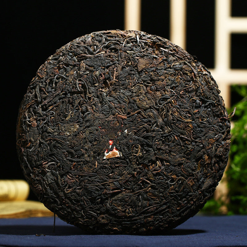 2003 Kong Ming Shan Pressed Qizi Cake of Yiwu Classic Tea Puerh Puer Raw 357g