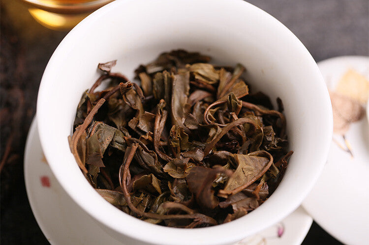 2003 Kong Ming Shan Pressed Qizi Cake of Yiwu Classic Tea Puerh Puer Raw 357g
