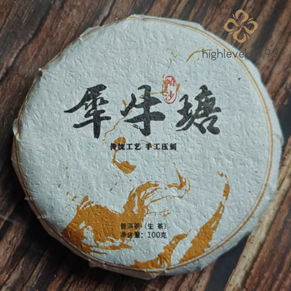 100G raw Pu'er tea cake Yunnan Xiniu Tanggu tree early spring leaf tea -