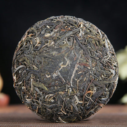 100g Raw Pu-erh Tea Kunlu Mountain Ancient Tree Menghai Mini Compressed Tea Cake