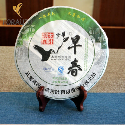 2011 MENGKU Mu Ye Chun Pu'er 茶早春普洱茶蛋糕 400 克生普洱旧-