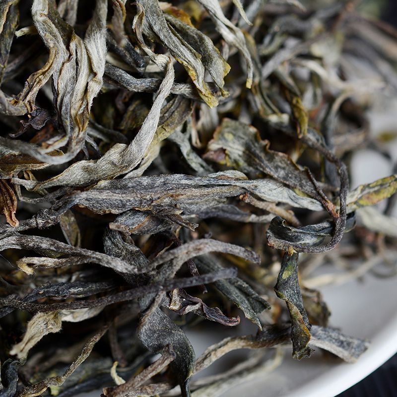 New tea Yunnan Puerh tea raw tea loose tea Mingqian first spring tea 100g