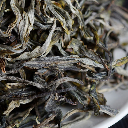 New tea Yunnan Puerh tea raw tea loose tea Mingqian first spring tea 100g
