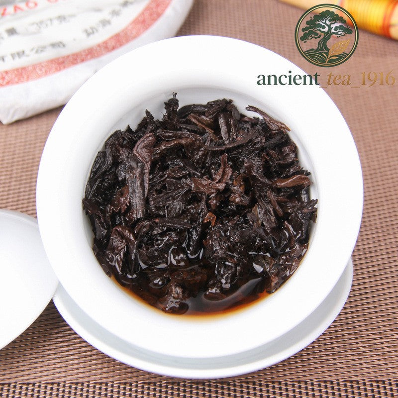 357g 2017 Pu'er Menghai Nannuoshan Qizi Tea Cake Ripe Tea Pu'er