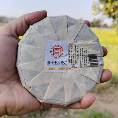 100G raw Pu'er tea Daxueshan ancient tree mini tea cake Yunnan Mengku -