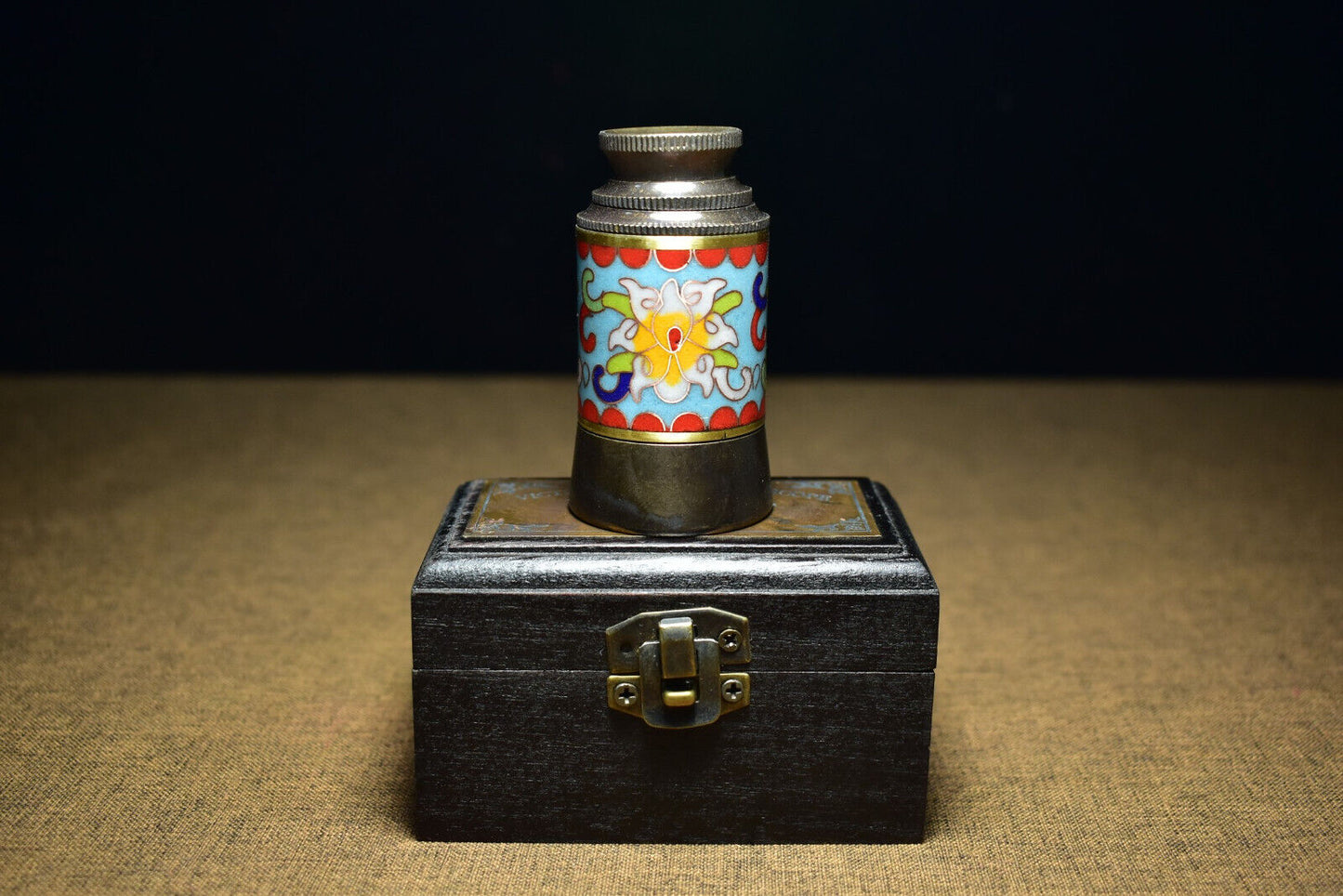An ancient brass based cloisonne telescope