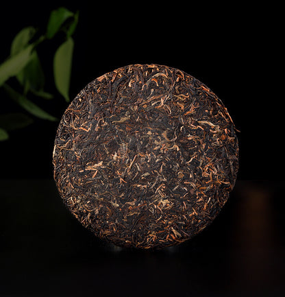 2006 Bajiaoting Valley Flower Tea Raw Pu'er KONG QUE ZHI XIANG QI ZI BING 357g