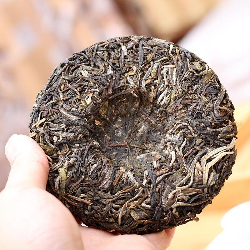 100gYunnan Tea Sheng Puer Lincang Tea Area Xigui Ancient Tree Raw Pu Er Tea Cake