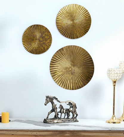 Set of 18", 15", and 12" Hanging Gold Color Ribbed Metal Circles Wall Decoration