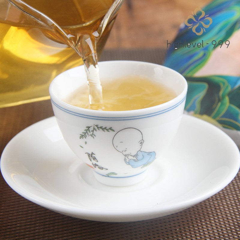 Pu'er tea cake 357g You Le ancient tree raw Pu'er tea Sheng Pu'er Yunnan -