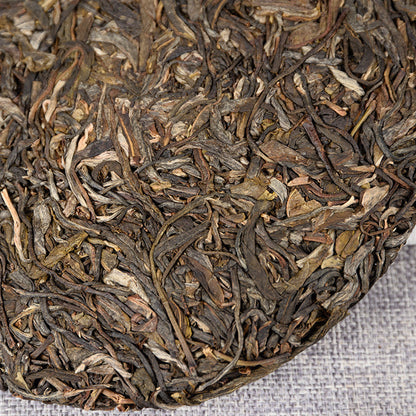 Yiwu Fenghuang Wo Seven Seeds Cake Spring Tea 357 Organic Green Tea Tea Cake