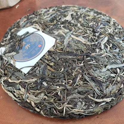 Yunnan Pu'er Tea He Kai Raw Tea Ancient Tree First Spring Pu'er Tea 357g