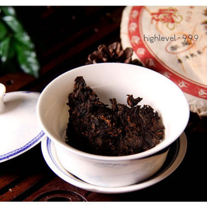 357g Ripe Pu'er Tea Cake 2012 Qicai Golden Peacock Gongting Menghai