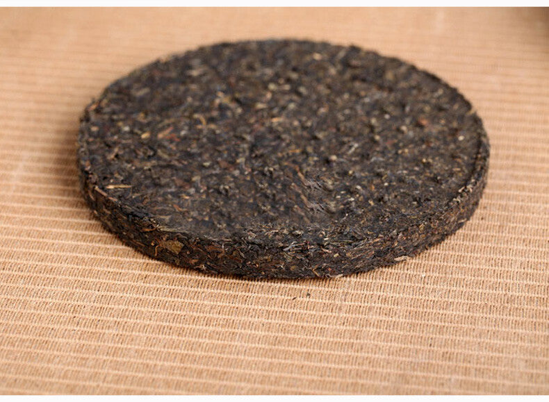 2007 XIAGUAN T8653 Discus Puerh Tea Cake Raw Puer Sheng Pu'er Aged Puerh 357g