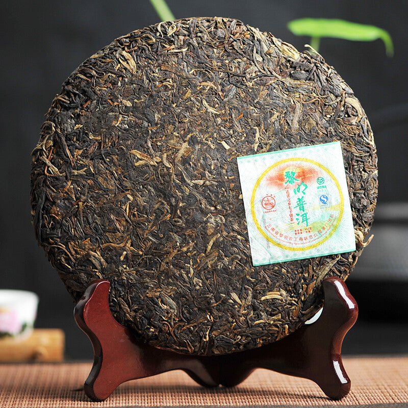 2007 Ba Jiao Ting Li ming Tea Peacock Township Pu'er Tea Green Raw Tea Cake 357g