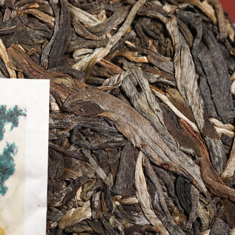 Pu'er Tea Old Ban Zhang Sheng Cha Qi Zi Cake Tea Menghai Tea 357g